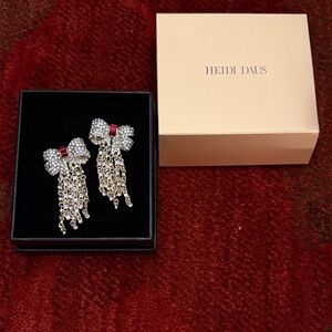 Heidi Daus Silver and Red Bow Dangle Earrings omega